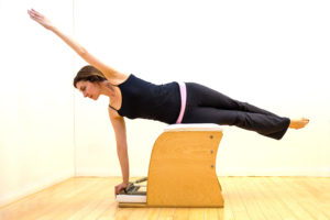 woman using pilates table